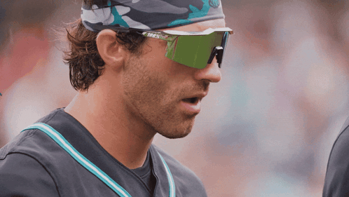 Baseball Player With Headband And Sunglasses Looking Left GIF