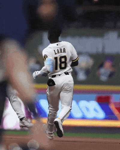 Baseball Player With Name Lara On Back GIF