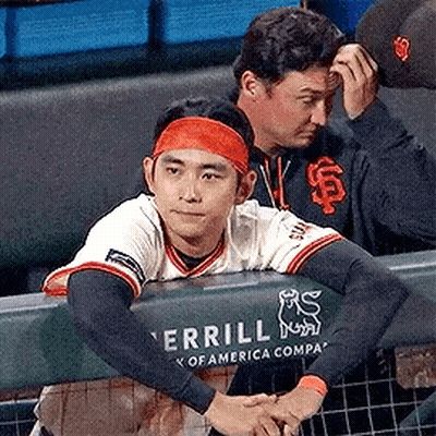 Baseball Player With Orange Headband Sitting GIF