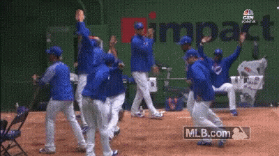 Baseball Players Celebrating Impact GIF