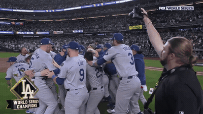 Baseball Players Celebrating World Series Win GIF