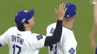 Baseball Players High Five On Field GIF
