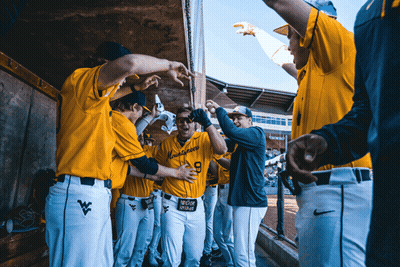 Baseball Players Huddled In Dugout With Virginia Tech Shirt GIF