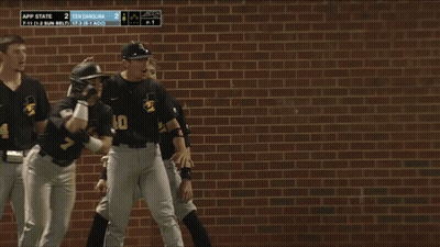 Baseball Players Huddled With Number 40 GIF