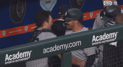 Baseball Players Hugging In Academy Sports Outdoors Dugout GIF