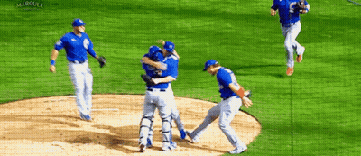 Baseball Players Hugging On Field GIF