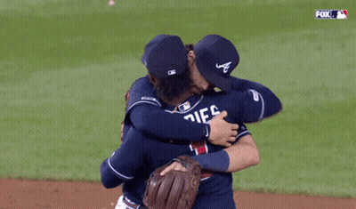 Baseball Players Hugging With Fox Logo GIF