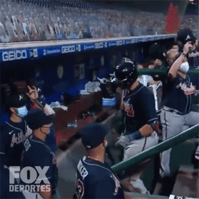 Baseball Players In Dugout With Fox Deportes GIF