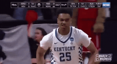 Baseball Players In Dugout With Number 1 Jersey GIF