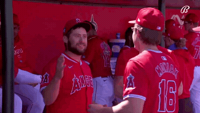 Baseball Players In Dugout With Number 16 GIF