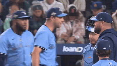 Baseball Players In Front Of Loan Sign GIF