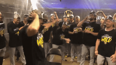 Baseball Players In Let's Get Wild Shirts GIF