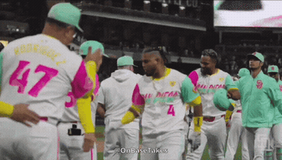 Baseball Players In Pink And Green Uniforms GIF