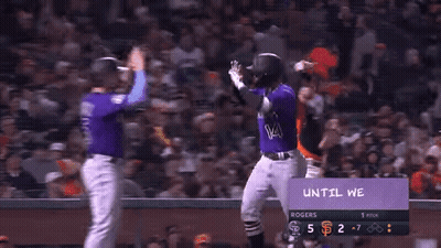 Baseball Players In Purple Colorado Uniforms GIF