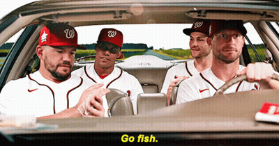 Baseball Players In W Hats Driving Car GIF