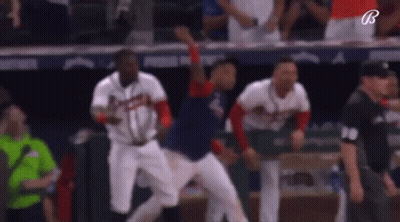 Baseball Players Jumping In Dugout GIF