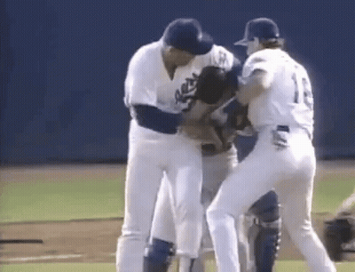 Baseball Players On Field With Number 1 Jersey GIF