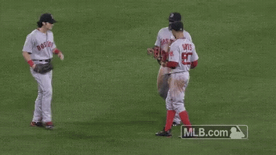 Baseball Players On Field With Number 50 Jersey GIF