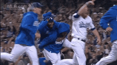 Baseball Players Running In Crowd GIF