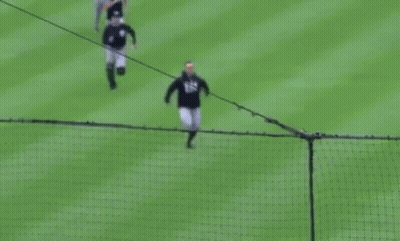 Baseball Players Running On Field GIF