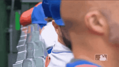 Baseball Players Sitting In Dugout GIF