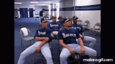 Baseball Players Sitting In Locker Room GIF