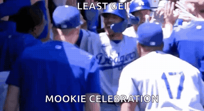 Baseball Players Standing In Crowd GIF