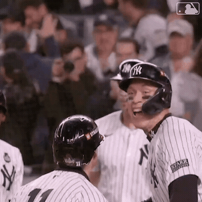 Baseball Players Standing In Stadium GIF