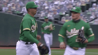Baseball Players Standing On Field GIF