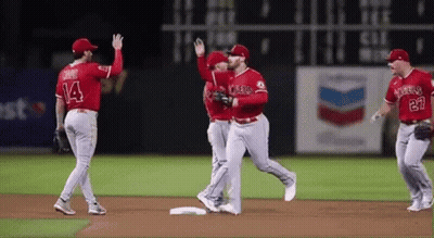 Baseball Players Standing On Field GIF