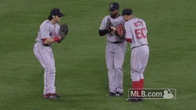Baseball Players Standing On Field GIF