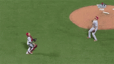 Baseball Players Standing On Field GIF