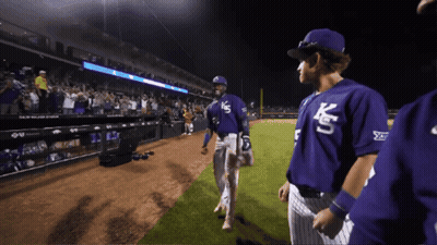 Baseball Players Wearing Purple Uniforms With Ks On The Front GIF