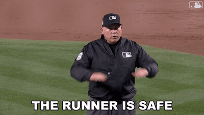 Baseball Umpire Calls Runner Safe GIF