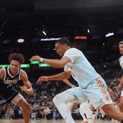 Basketball Game In Front Of Americus Diamond Sign GIF
