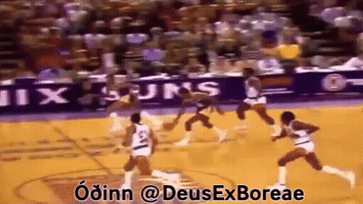 Basketball Game In Front Of Banner Saying Ix Suns GIF