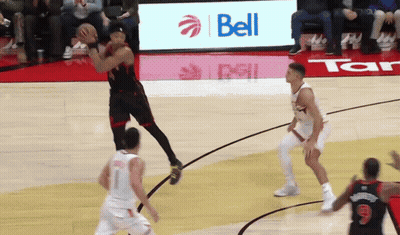 Basketball Game In Front Of Bell Ad GIF