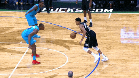 Basketball Game In Front Of Bucks Com Sign GIF
