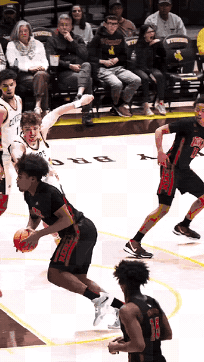 Basketball Game In Front Of Crowd In Stands GIF