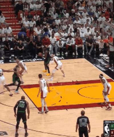 Basketball Game In Front Of Crowd With NBA Scoreboard GIF