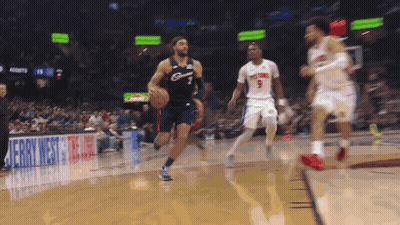 Basketball Game In Front Of Jerry West Sign GIF