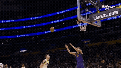 Basketball Game In Front Of Lakers.com Sign GIF