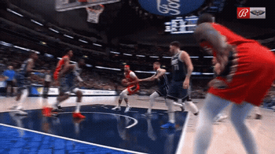 Basketball Game In Front Of Large Ford Sign GIF