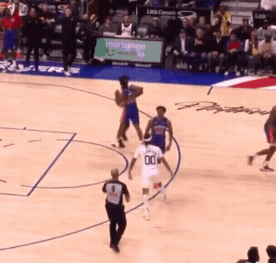 Basketball Game In Front Of Mortgage Ad GIF