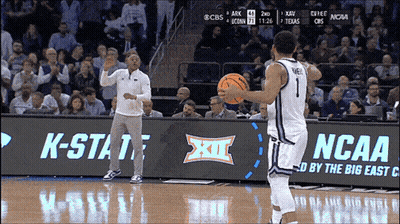 Basketball Game In Front Of NCAA Banner GIF