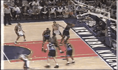 Basketball Game In Front Of New York Knicks Sign GIF
