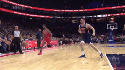 Basketball Game In Front Of Nissan Sign GIF