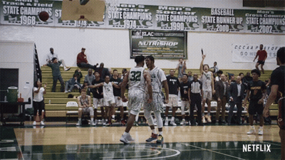 Basketball Game In Front Of Nutrishop Banner GIF