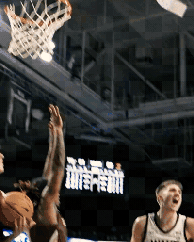 Basketball Game In Front Of Scoreboard Saying Tottenham GIF