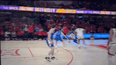 Basketball Game In Front Of Sign Saying None Of The Spice GIF